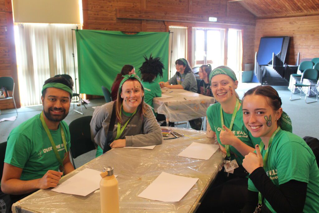 April and volunteers at camp