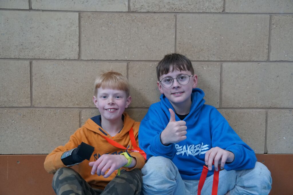 James with friend at residential camp