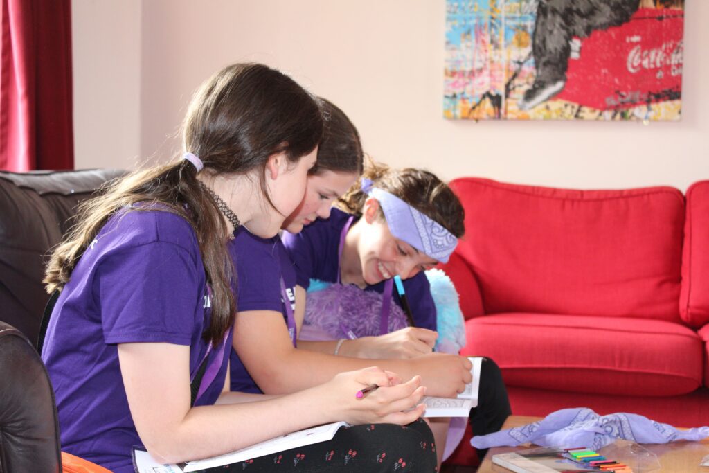 Campers doing arts and crafts